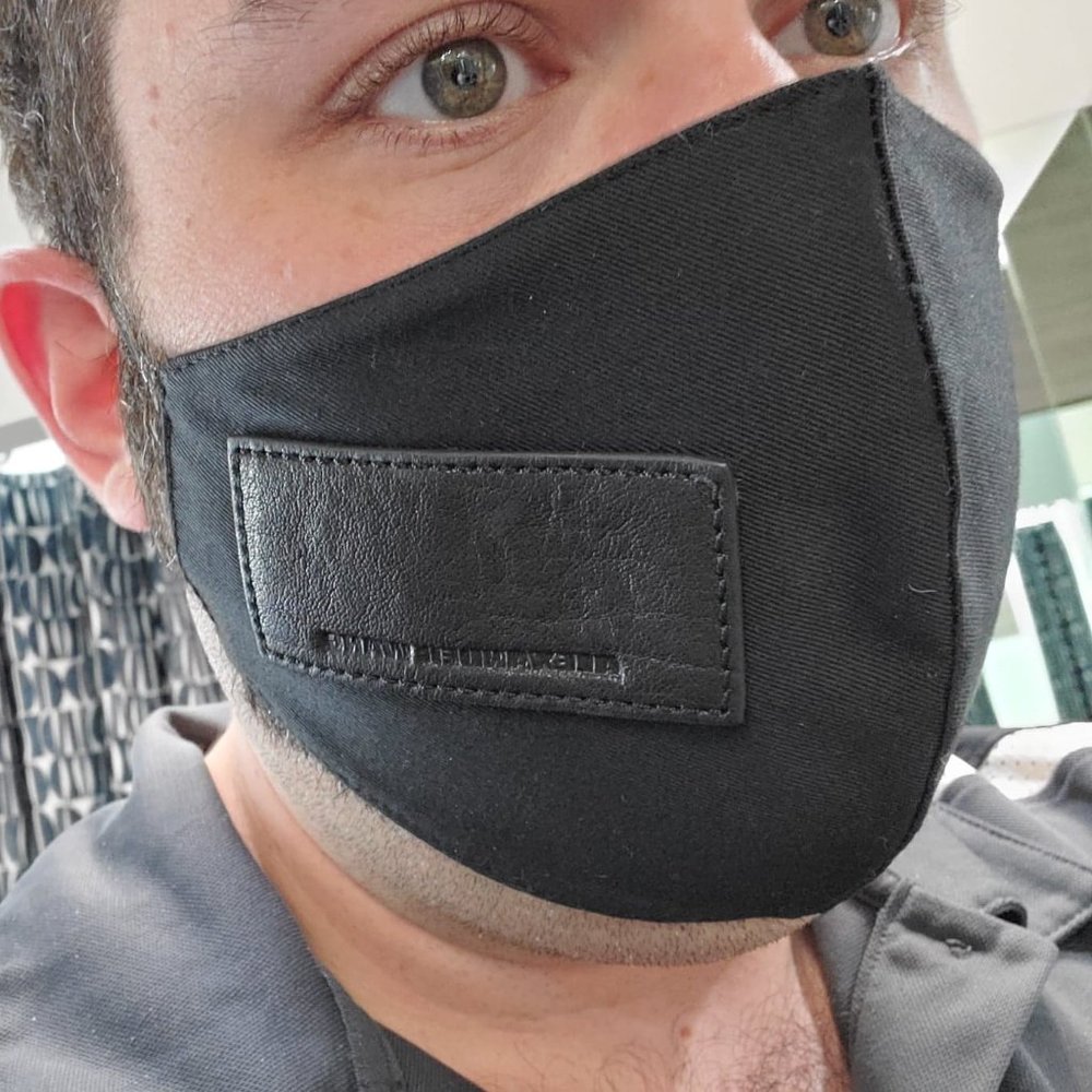Black facemask with alexander wang leather tag